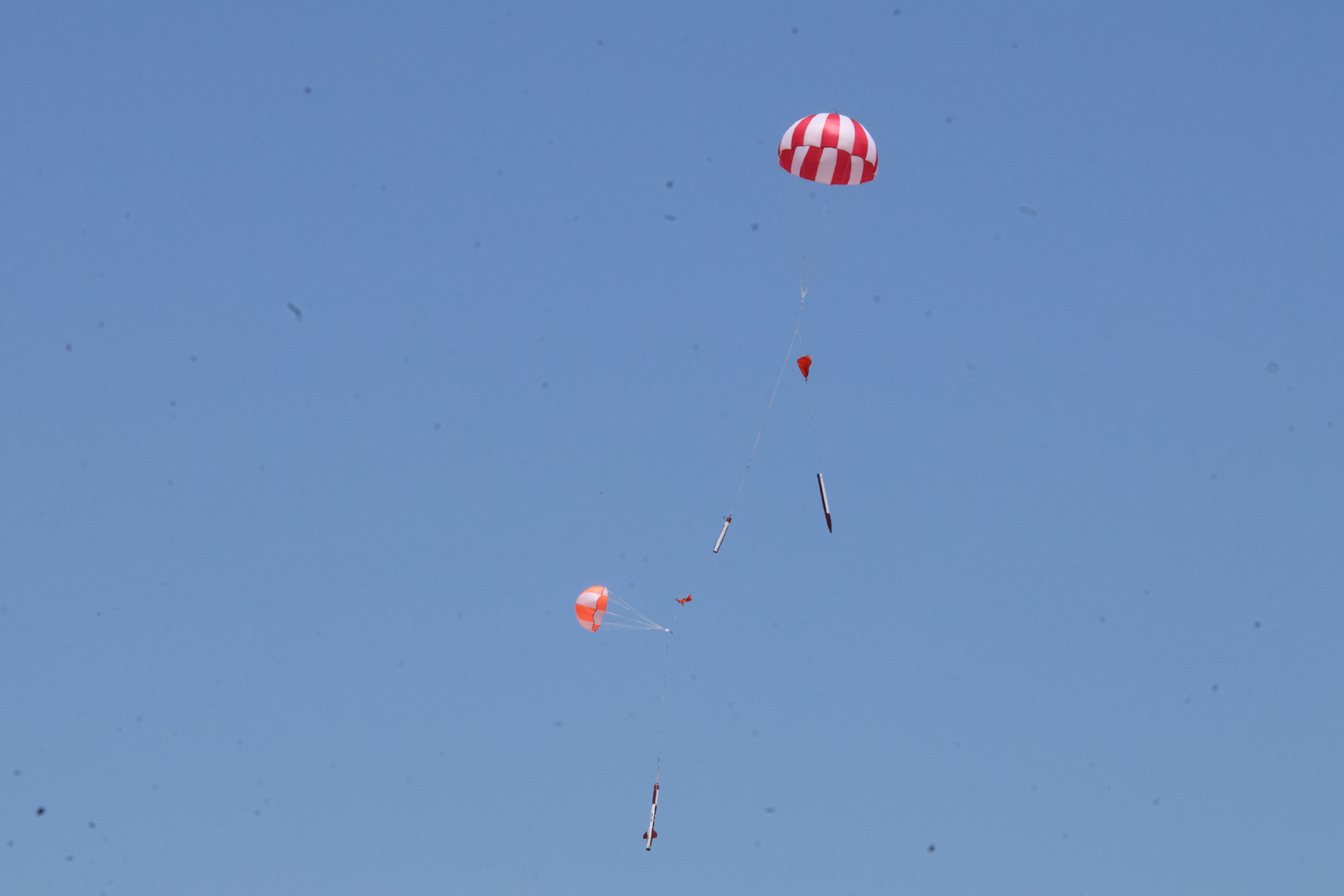 Thunderbolt desending under parachute